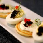 Poached eggs with caviar